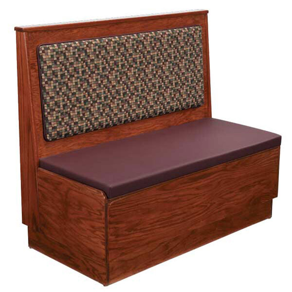 A wooden bench with a purple cushion on a backrest.