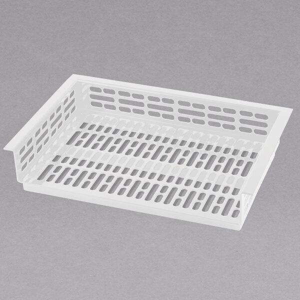 A white Tablecraft plastic drop-in well template with holes.