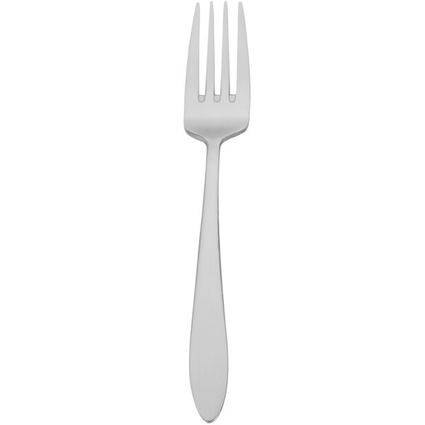 A silver Walco salad fork with a white handle.