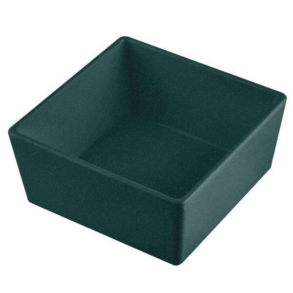 A Tablecraft hunter green and white speckled square bowl with a lid on a counter.