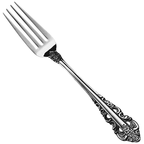 A Walco stainless steel dinner fork with a Fieldstone finish and an ornate pattern on the handle.