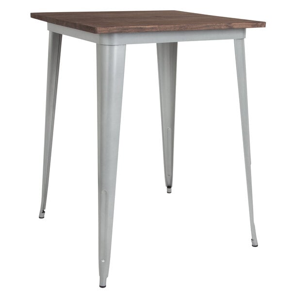 A Flash Furniture bar height table with a walnut top and silver metal frame.