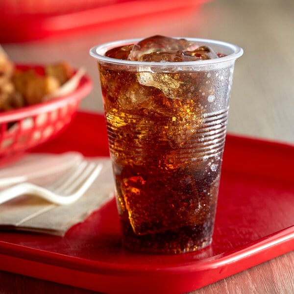 A 10 oz. plastic cup filled with soda
