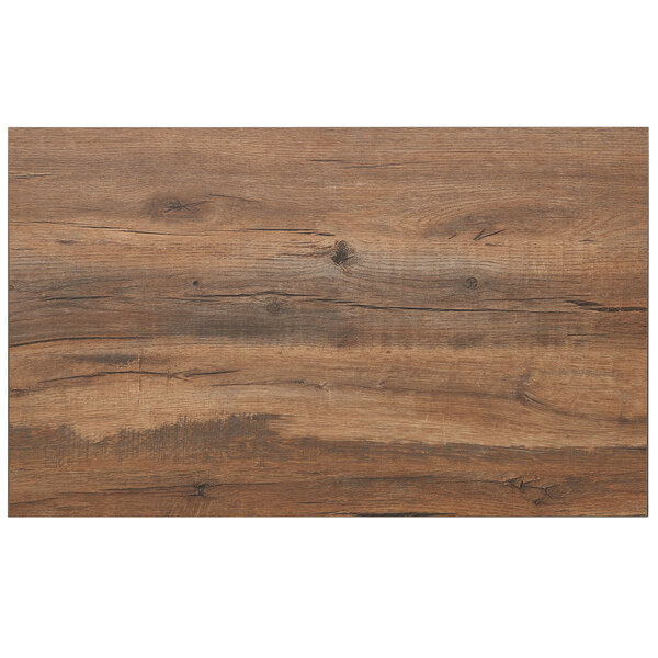 A BFM Seating knotty pine rectangular table top with a wood grained surface and knots.