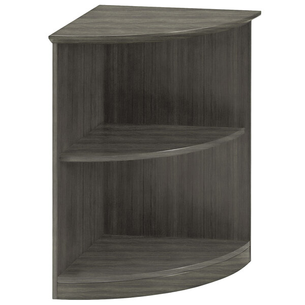 A Safco Medina gray steel quarter round corner bookcase with two shelves.