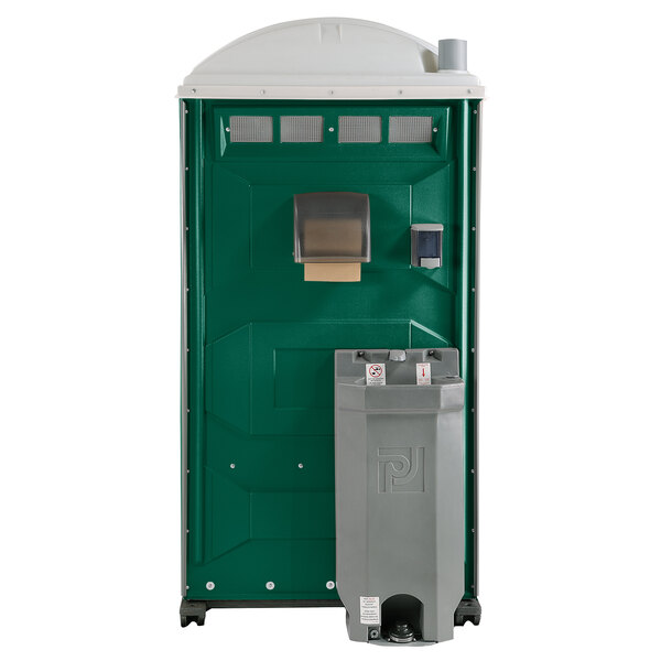 A green and white PolyJohn portable toilet with a grey sink, soap, and towel dispenser.