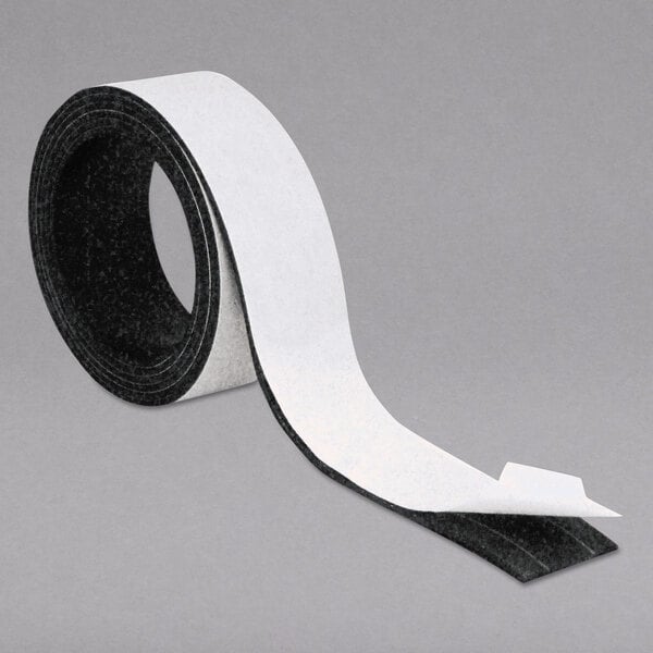 A roll of MasterVision magnetic tape with a black and white strip.