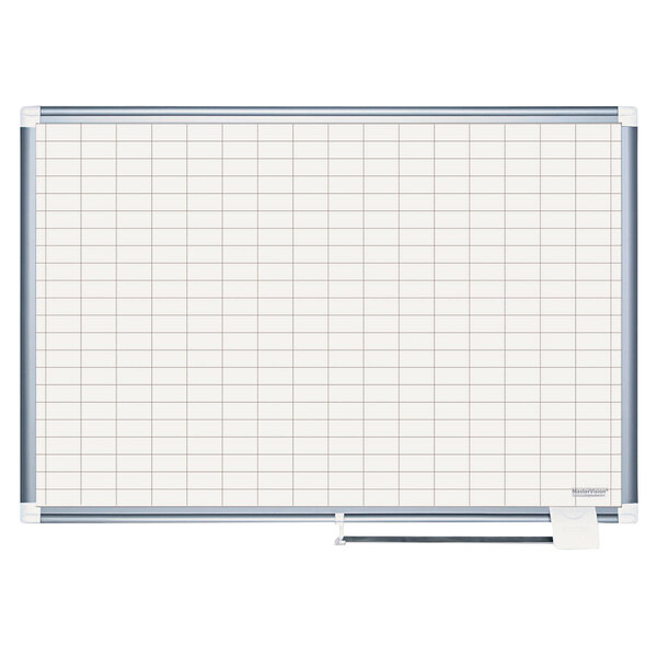 A MasterVision whiteboard with a grid on it.