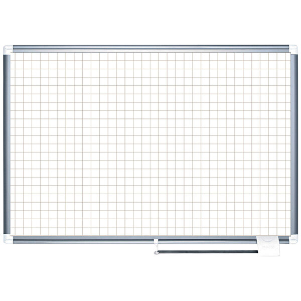 A MasterVision white board with grid lines.