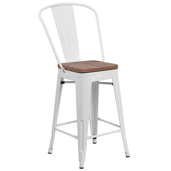 A white metal restaurant bar stool with a wood seat and vertical slat back.