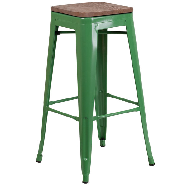 A green Flash Furniture bar stool with a wooden seat.