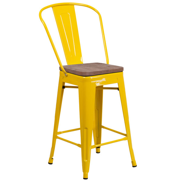A yellow metal Flash Furniture restaurant bar stool with a wooden seat.