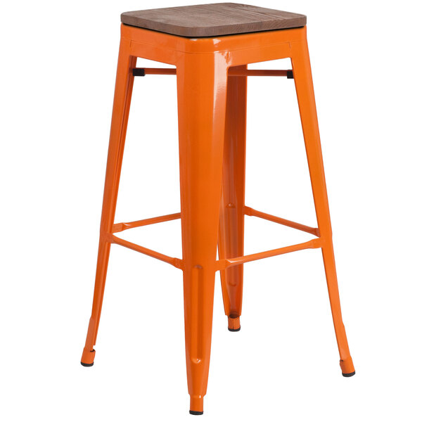 An orange stool with a square wooden seat.