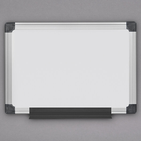 A MasterVision white board with a black aluminum frame and black corners.