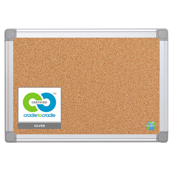 A MasterVision cork board with an aluminum frame.