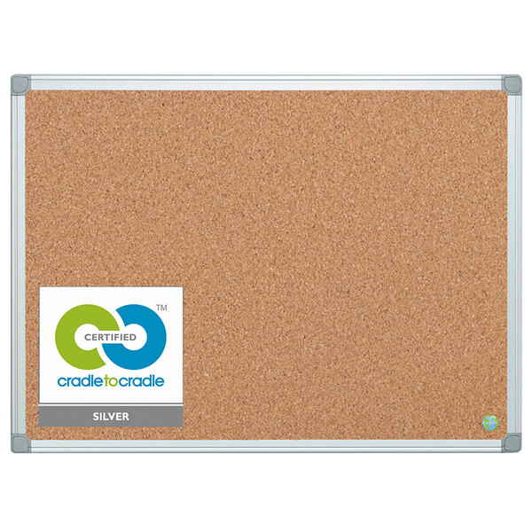 A MasterVision cork board with a white frame.