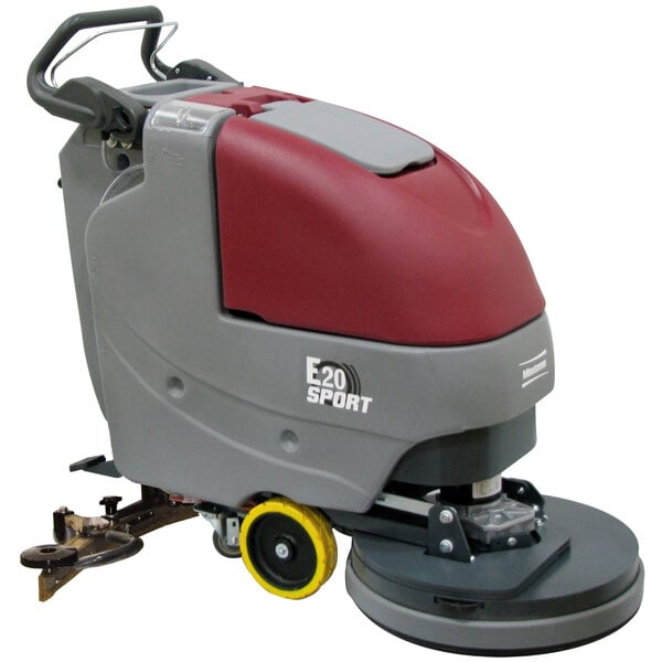 A Minuteman E20 SPORT cordless walk behind floor scrubber with red and yellow wheels.
