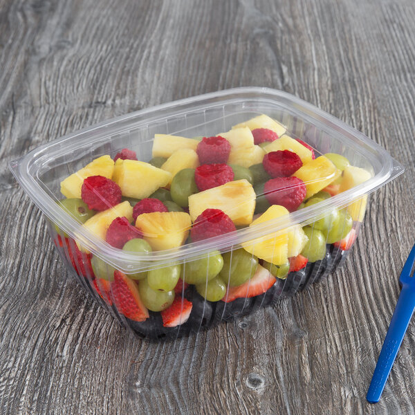 A rectangular Eco-Products PLA plastic deli container filled with fruit.