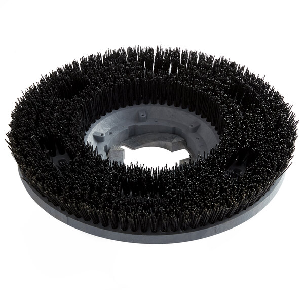 A circular black Minuteman Poly-Nylogrit brush with black bristles.