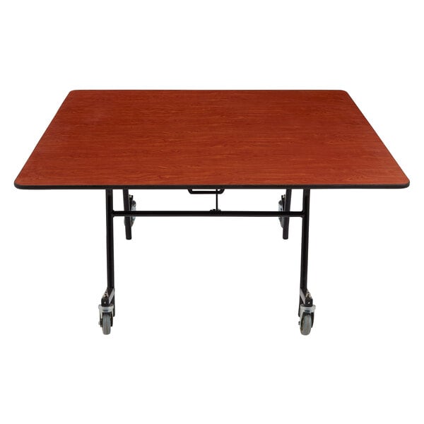 A National Public Seating square wood cafeteria table with a black frame and ProtectEdge.