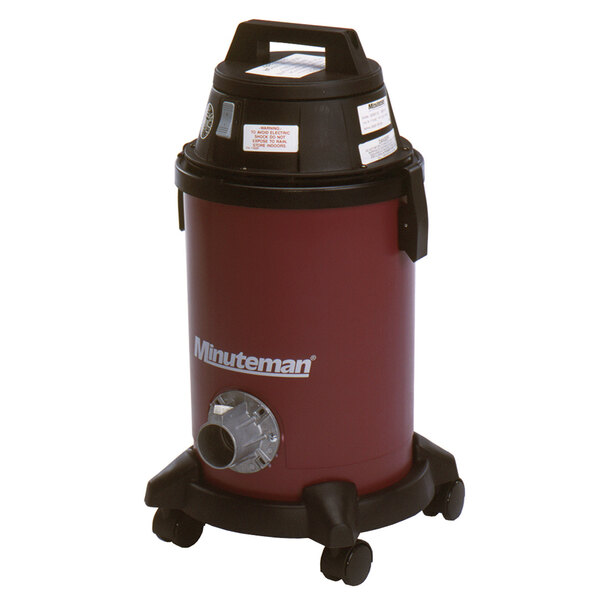 A red and black Minuteman wet / dry vacuum cleaner on wheels.