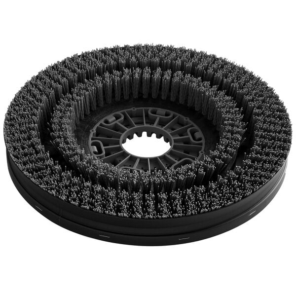 A black circular Minuteman disc brush with bristles.