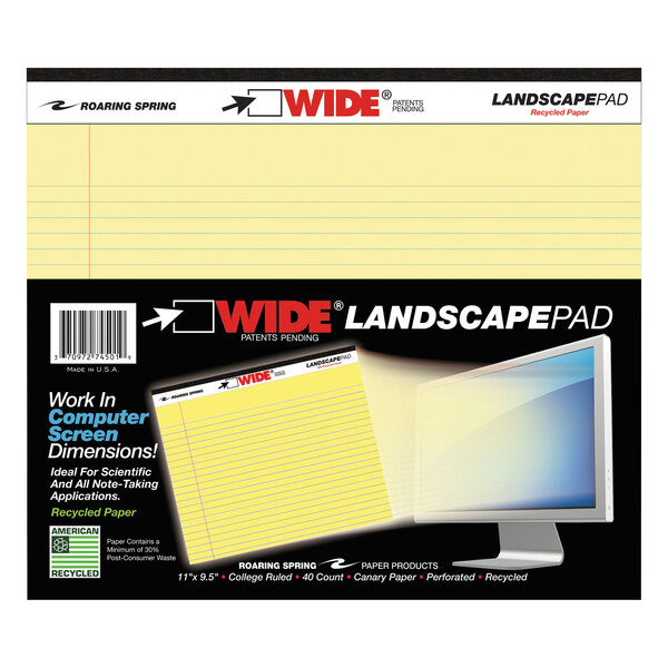 A Roaring Spring landscape writing pad with yellow paper on a table.
