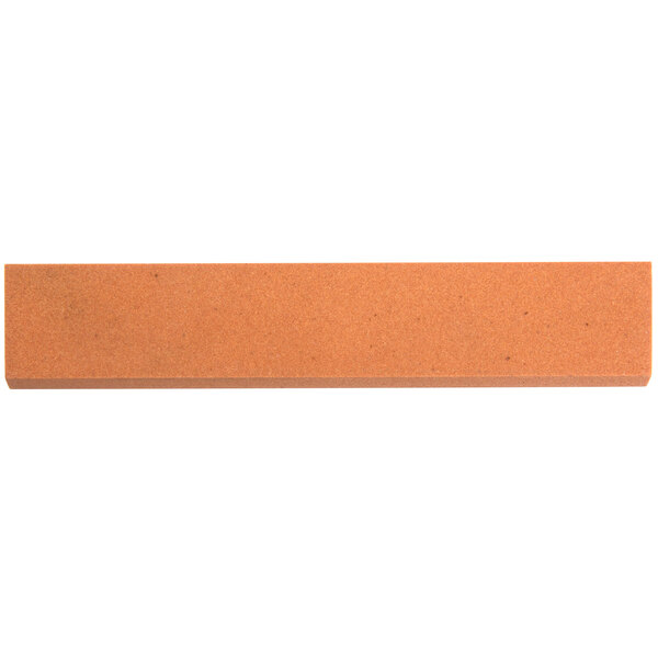 A rectangular brown sharpening stone.