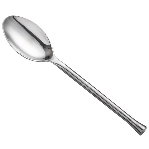 A Oneida Wyatt stainless steel serving spoon with a long silver handle.