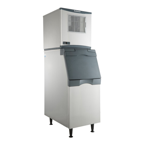 A white and grey rectangular Scotsman air cooled ice machine with a black lid.