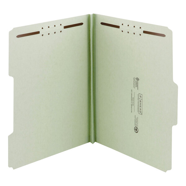 A white file folder with green tabs and two holes.