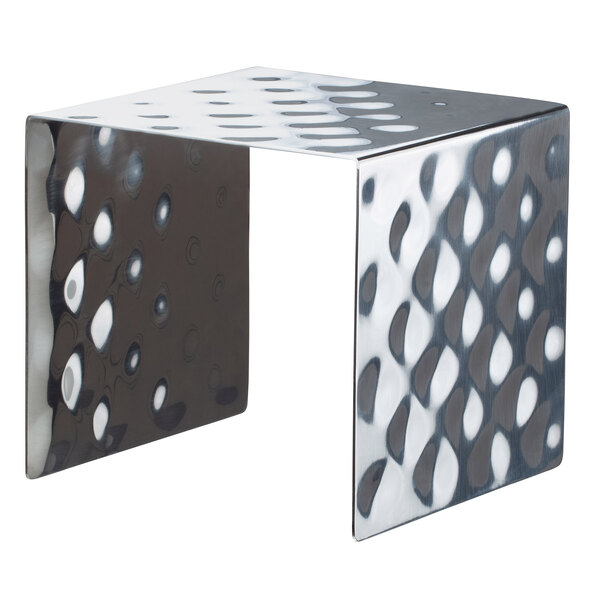 A stainless steel square showcase stand with a hammered texture and holes in it.