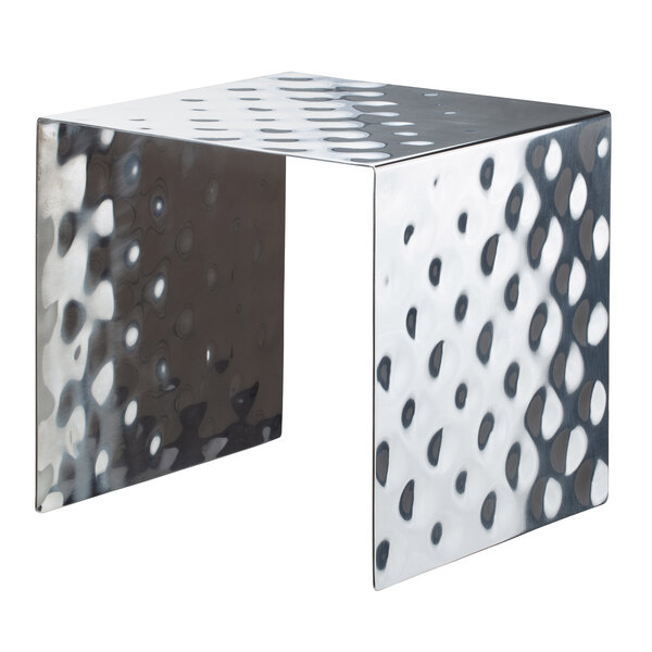 A silver metal square showcase stand with holes in it.