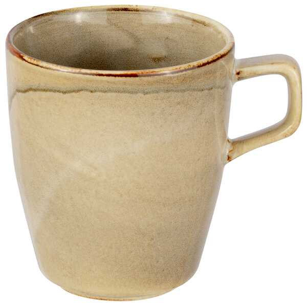 A Bon Chef Tavola Harbour porcelain mug in beige with a handle.
