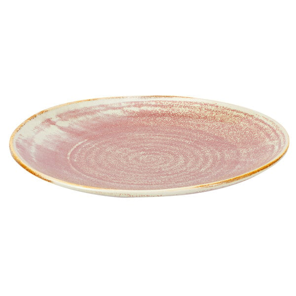 A close-up of a Bon Chef Tavola Blush porcelain bread and butter plate with a pink and gold rim.