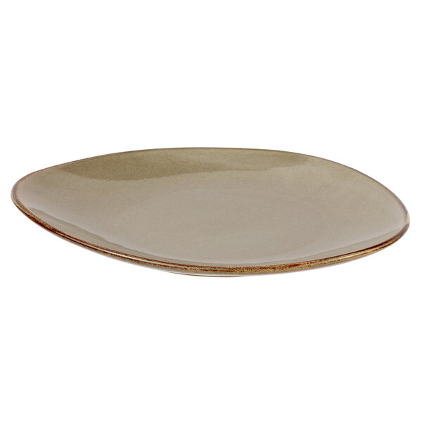 A beige porcelain dinner plate with a brown rim.
