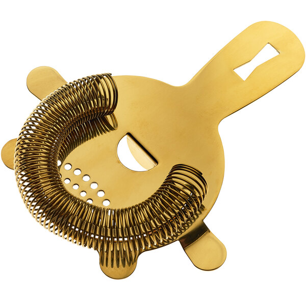 A gold-plated metal Barfly Hawthorne Strainer with a 4 prong spring.