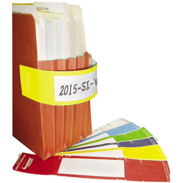 A yellow Tabbies file pocket handle on a file folder.