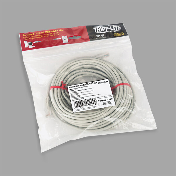 A package of gray cable with a red label.
