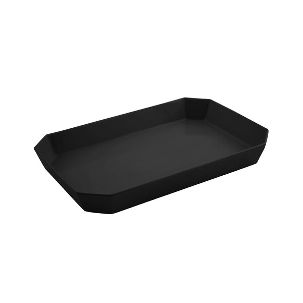 A black octagonal casserole dish with a white background.