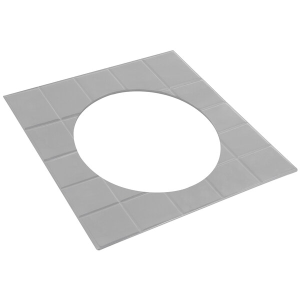 A gray tile with a circular hole in a white square.