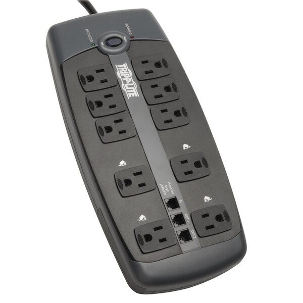 A close-up of a black Tripp Lite surge protector with multiple outlets.