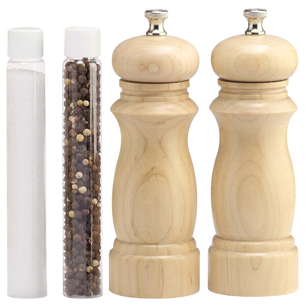 A wooden salt shaker with a lid and a wooden pepper mill with a black border.