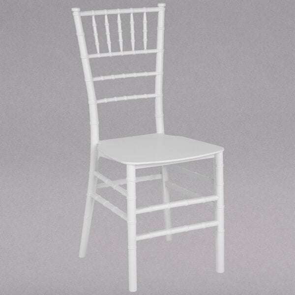 A white Flash Furniture resin chiavari chair with a cushion.