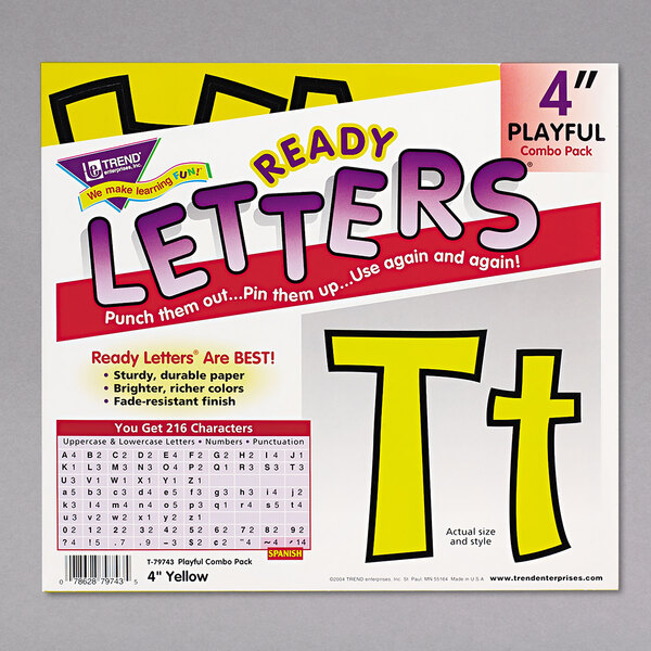 A box of yellow paper letters and numbers.