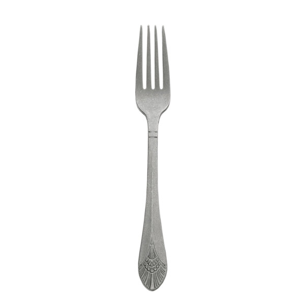 A stainless steel Libbey Vintage dinner fork with a design on the handle.