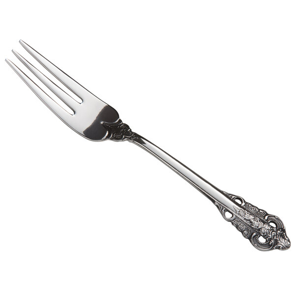 A Libbey stainless steel cocktail fork with a design on the handle.