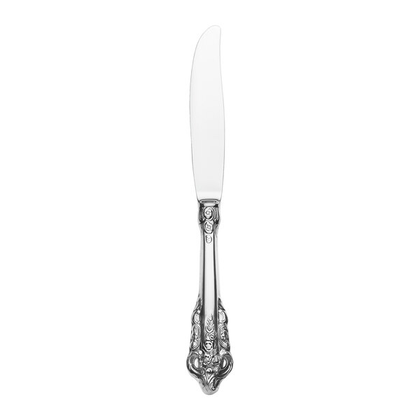 A silver Reserve by Libbey stainless steel dinner knife with a silver handle.
