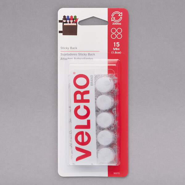 A package of Velcro® white sticky back circle fasteners.