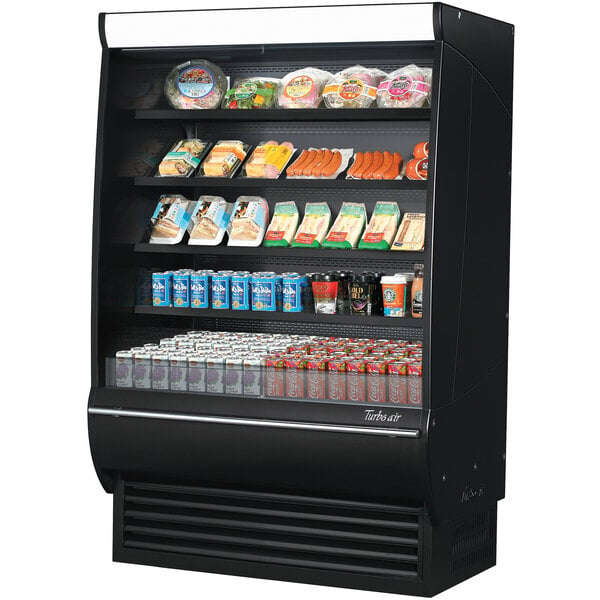 A black Turbo Air air curtain merchandiser with different types of food on shelves.